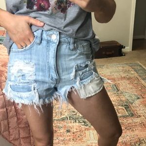 Distressed denim shorts